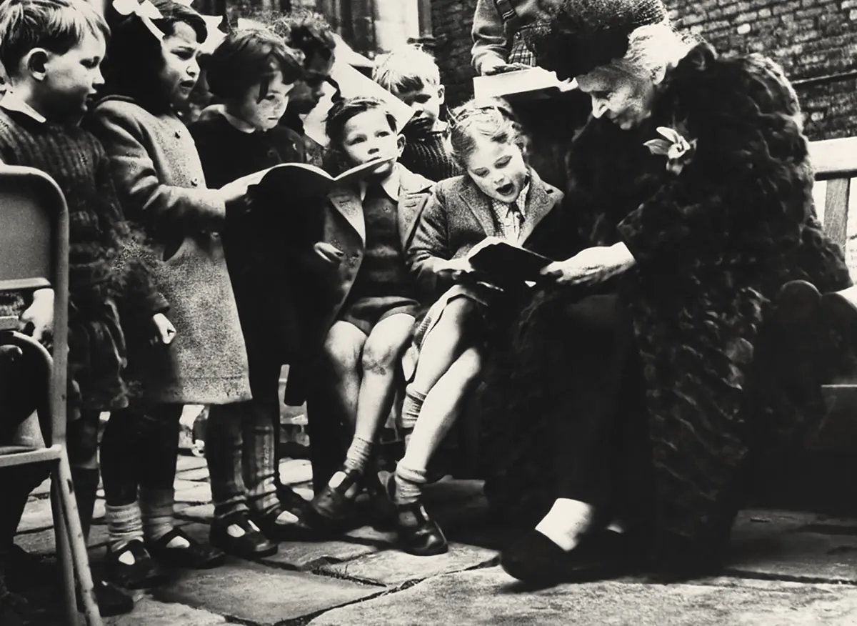 Dr. Maria Montessori with children